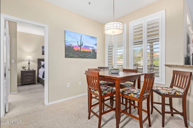 11375 E Sahuaro Dr Unit 2033, Scottsdale, AZ 85259 - carpeted dining space featuring baseboards