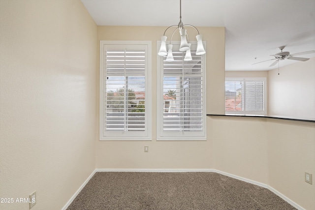 11375 E Sahuaro Dr Unit 2033, Scottsdale, AZ 85259 - unfurnished dining area with carpet flooring, a chandelier, and ceiling fan