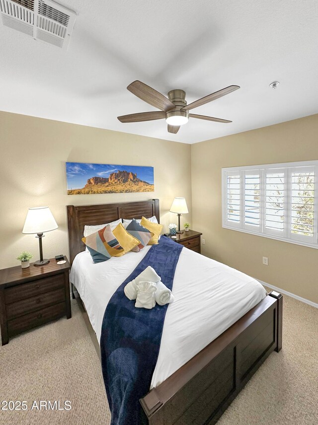 11375 E Sahuaro Dr Unit 2033, Scottsdale, AZ 85259 - carpeted bedroom featuring a ceiling fan and baseboards