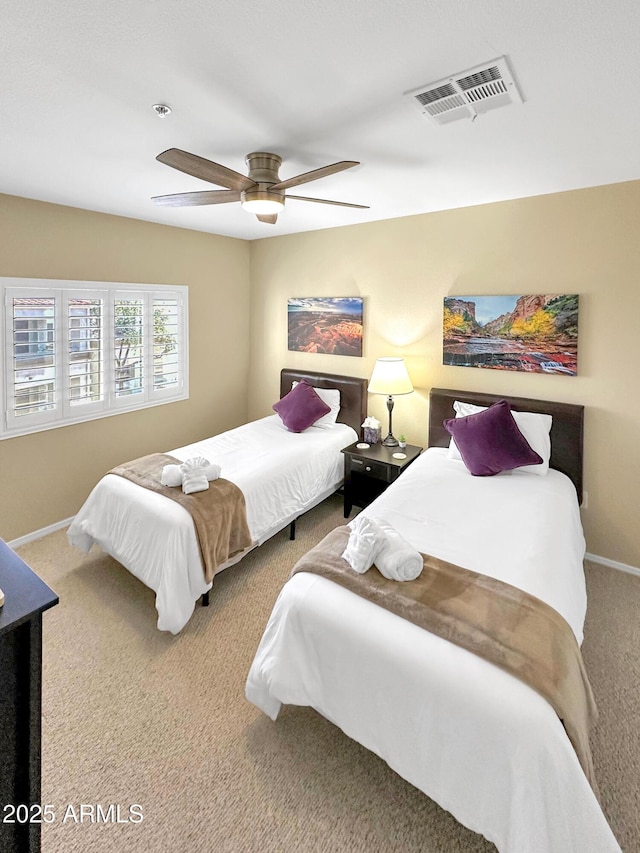 11375 E Sahuaro Dr Unit 2033, Scottsdale, AZ 85259 - bedroom with carpet floors and ceiling fan