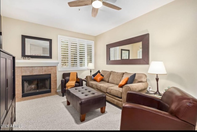11375 E Sahuaro Dr Unit 2033, Scottsdale, AZ 85259 - carpeted living room featuring ceiling fan and a tile fireplace