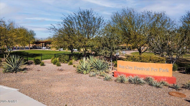 view of property's community featuring fence