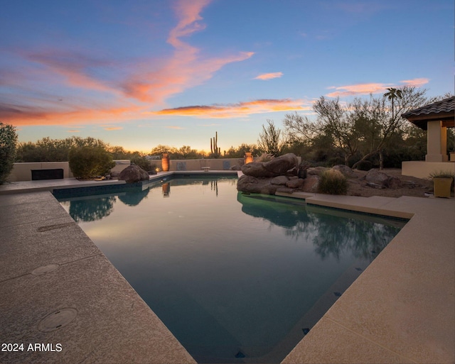pool with a patio