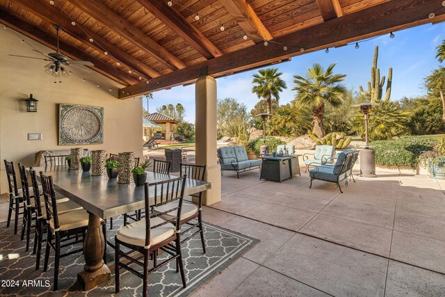 view of patio featuring an outdoor living space and ceiling fan