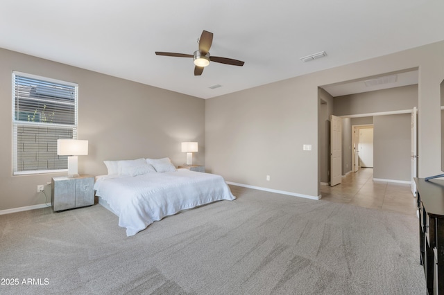 bedroom with light colored carpet and ceiling fan