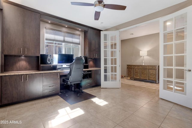 office area featuring french doors, ceiling fan, and light tile patterned flooring