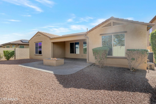 rear view of house featuring a patio