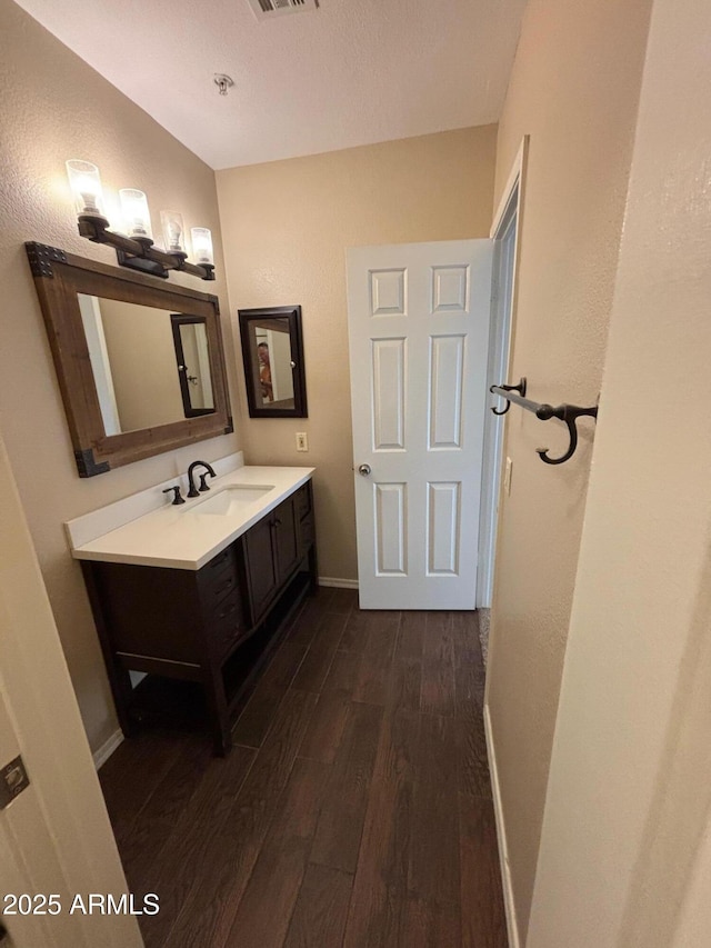 1825 W Ray Rd Unit 2082, Chandler, AZ 85224 - bathroom featuring wood finished floors and vanity