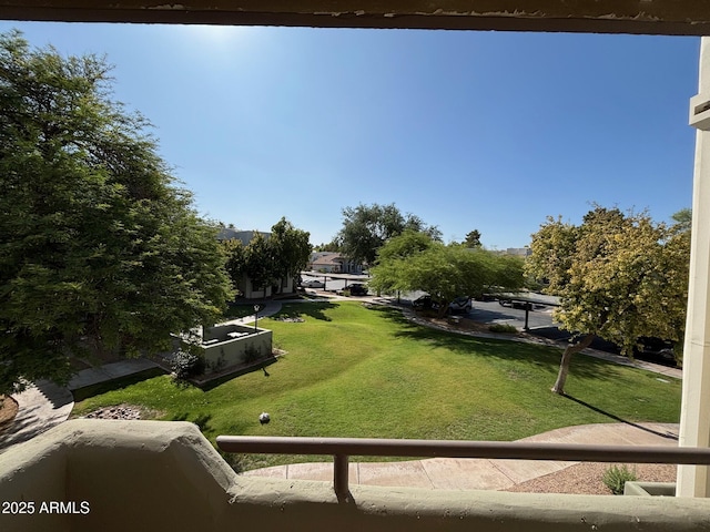 1825 W Ray Rd Unit 2082, Chandler, AZ 85224 - view of green lawn featuring a balcony