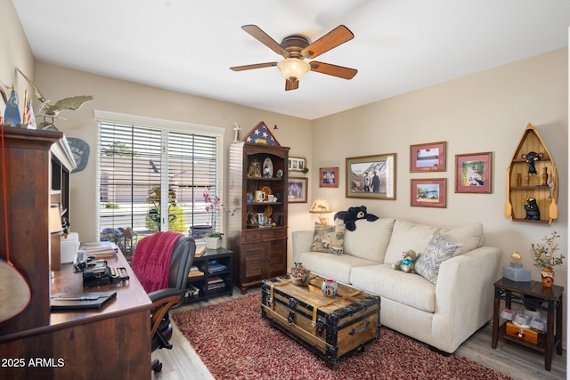 office area featuring wood finished floors and a ceiling fan