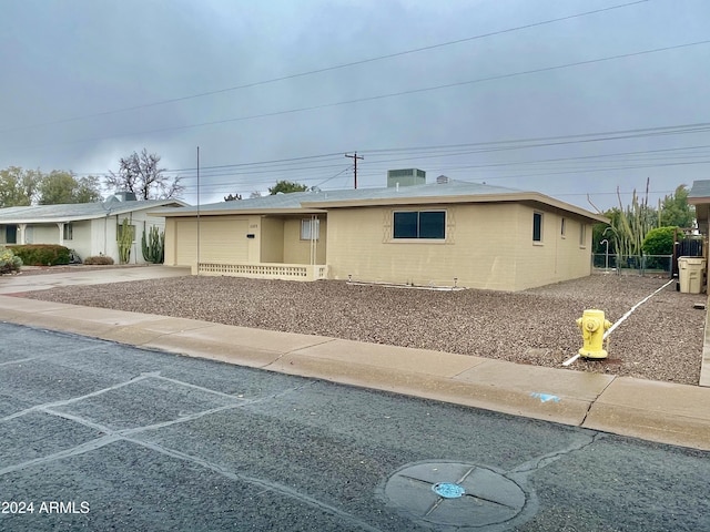 5522 E Colby St, Mesa, AZ 85205 - ranch-style home featuring concrete driveway and an attached garage