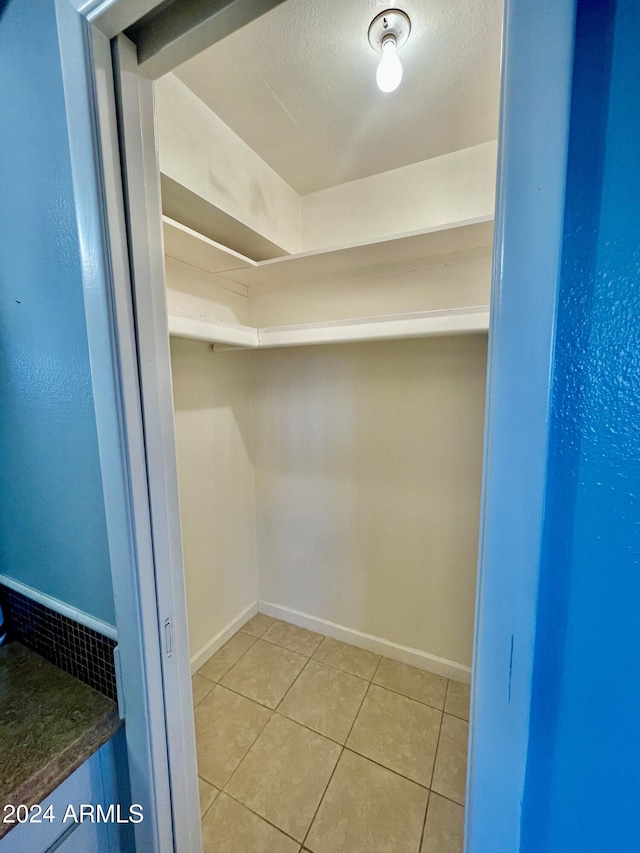 5522 E Colby St, Mesa, AZ 85205 - walk in closet with light tile patterned flooring