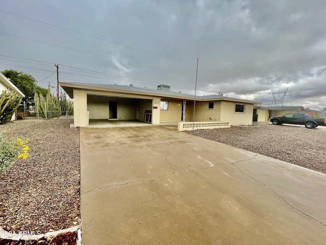 5522 E Colby St, Mesa, AZ 85205 - view of front facade featuring concrete driveway and a carport