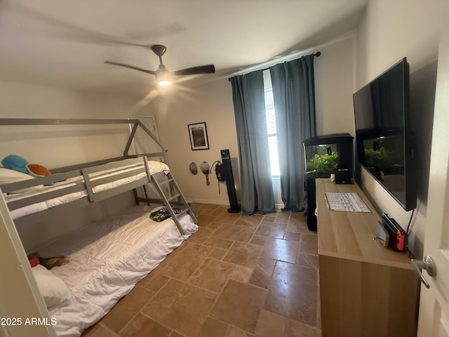 10029 S 44th St, Phoenix, AZ 85044 - bedroom with stone tile flooring and a ceiling fan