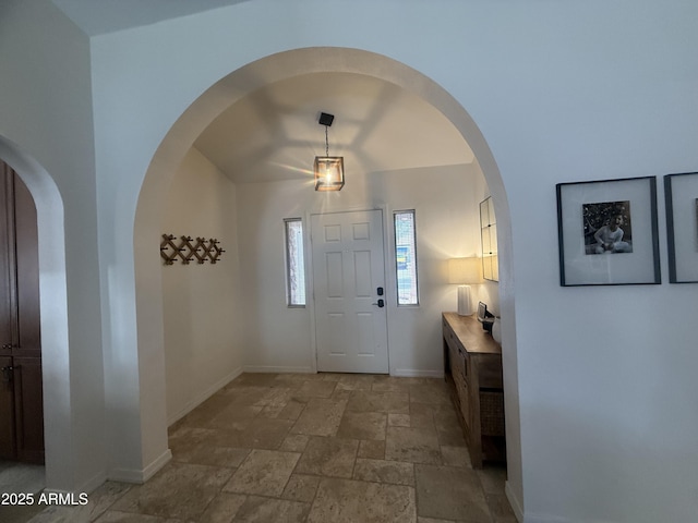 10029 S 44th St, Phoenix, AZ 85044 - foyer with stone tile flooring and arched walkways