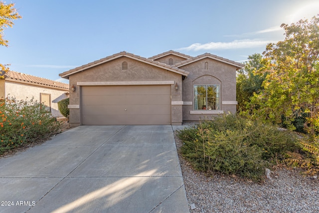 view of front of property with a garage