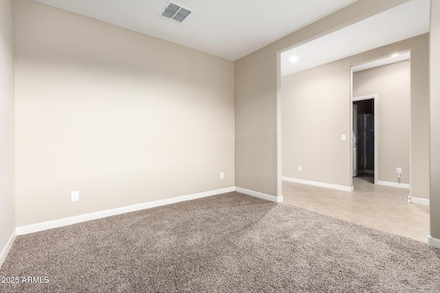 view of carpeted spare room