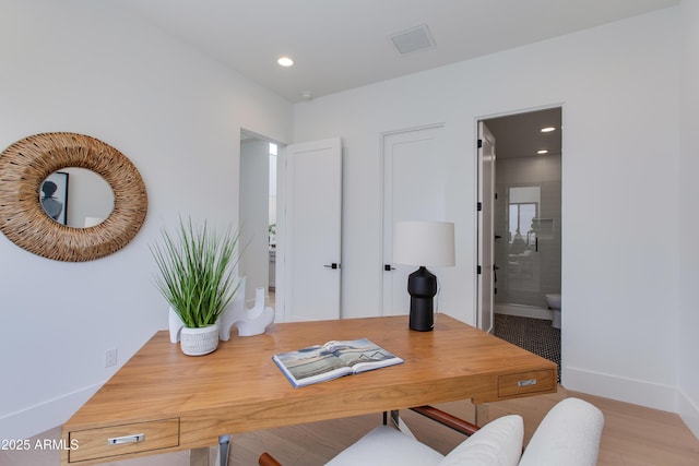 office with baseboards, visible vents, and recessed lighting