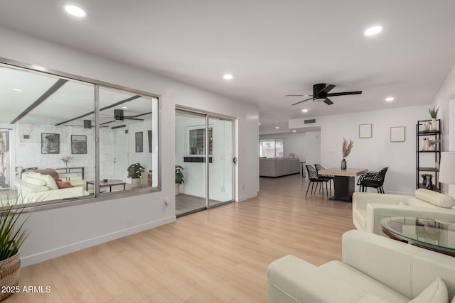 7811 N 32nd Ave, Phoenix, AZ 85051 - living room featuring visible vents, a ceiling fan, recessed lighting, light wood finished floors, and baseboards