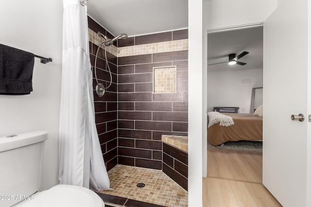 7811 N 32nd Ave, Phoenix, AZ 85051 - ensuite bathroom featuring a ceiling fan, toilet, ensuite bathroom, and a tile shower