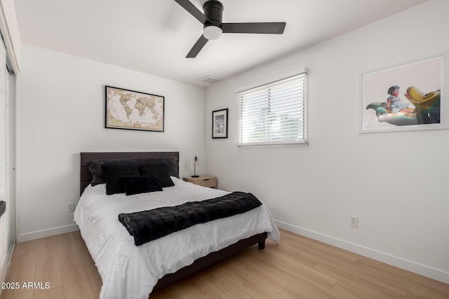 7811 N 32nd Ave, Phoenix, AZ 85051 - bedroom featuring a ceiling fan, visible vents, wood finished floors, and baseboards