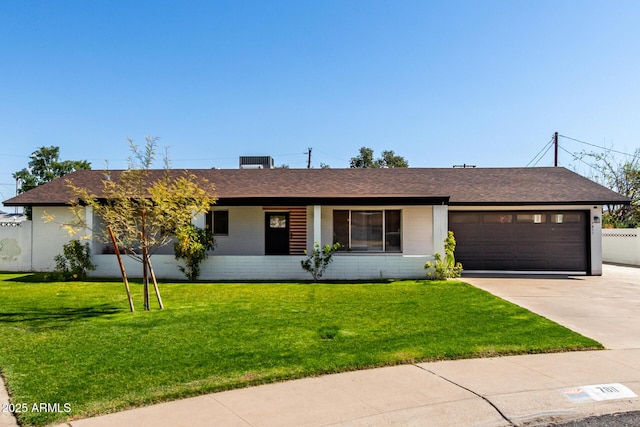 7811 N 32nd Ave, Phoenix, AZ 85051 - single story home with a front lawn, a garage, driveway, and a shingled roof