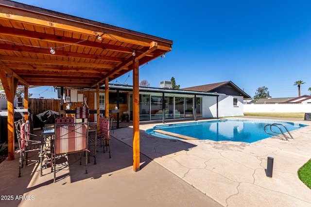 7811 N 32nd Ave, Phoenix, AZ 85051 - view of swimming pool featuring a fenced in pool, fence, and a patio area