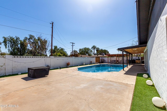 7811 N 32nd Ave, Phoenix, AZ 85051 - view of swimming pool with a patio area, a fenced in pool, and a fenced backyard