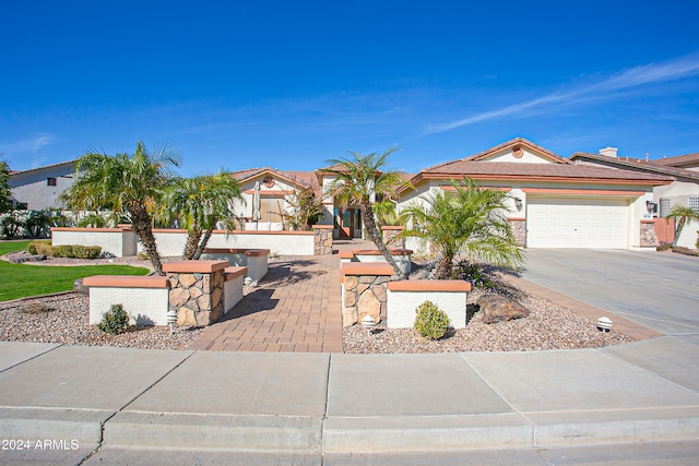 view of front of home featuring a garage