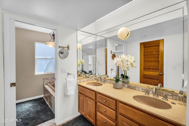 7832 E Via Marina, Scottsdale, AZ 85258 - full bathroom featuring double vanity, a bath, and tile patterned floors