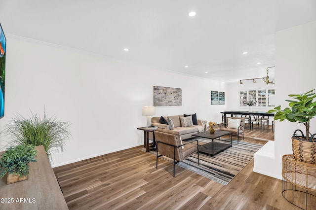 7832 E Via Marina, Scottsdale, AZ 85258 - living room with recessed lighting, wood finished floors, crown molding, and a chandelier