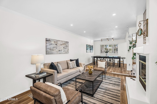 7832 E Via Marina, Scottsdale, AZ 85258 - living area with wood finished floors, recessed lighting, and crown molding