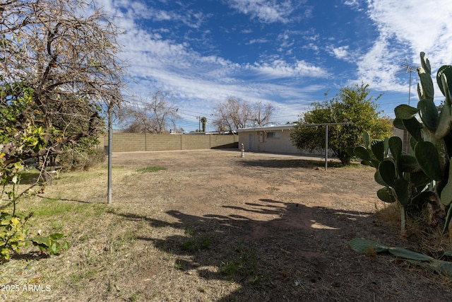 view of yard featuring a fenced backyard