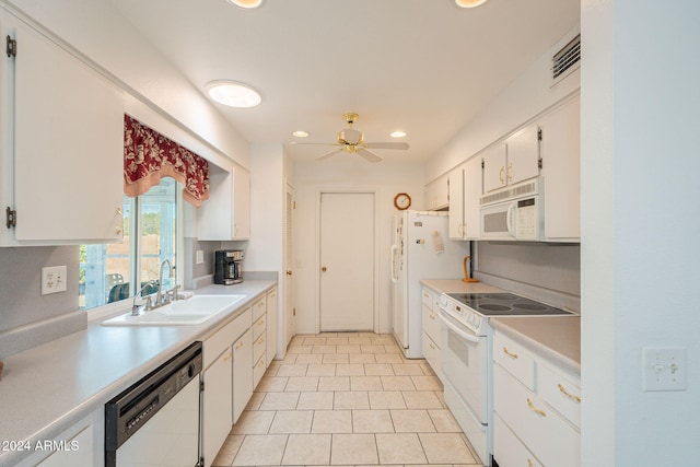 kitchen with sink, light tile patterned flooring, white cabinetry, white appliances, and ceiling fan