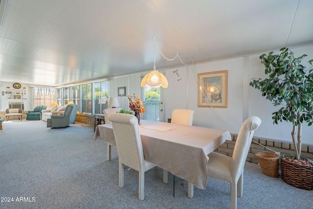 view of carpeted dining area