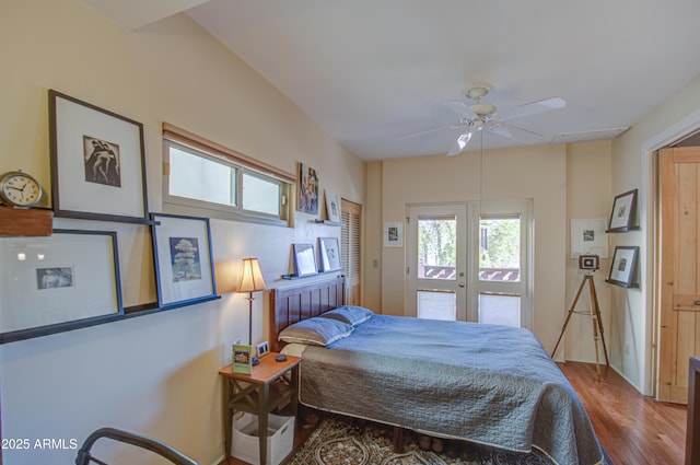 bedroom with ceiling fan, wood-type flooring, and french doors