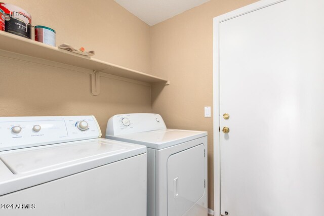 laundry area featuring washing machine and dryer