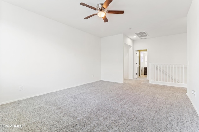 21243 W Coronado Rd, Buckeye, AZ 85396 - spare room featuring baseboards, light colored carpet, ceiling fan, and recessed lighting
