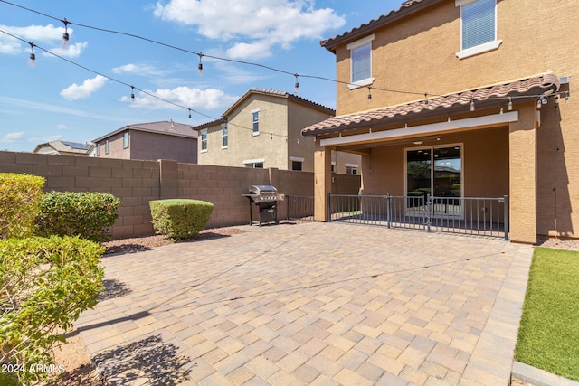 21243 W Coronado Rd, Buckeye, AZ 85396 - view of patio with area for grilling and fence