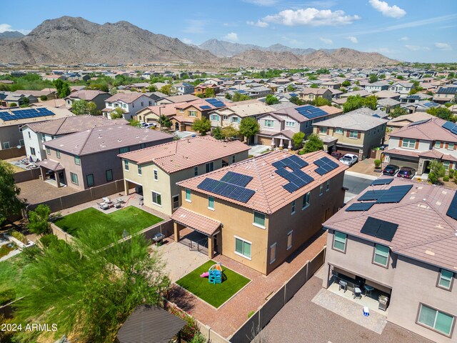 birds eye view of property featuring a mountain view