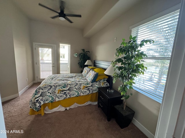 bedroom with multiple windows, carpet, and ceiling fan