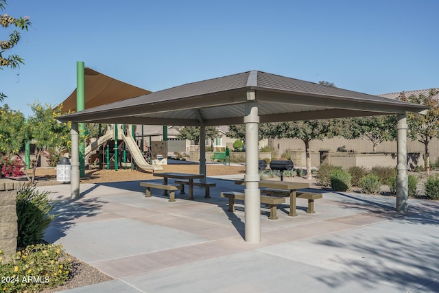 surrounding community featuring a gazebo and a playground