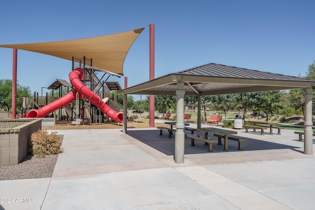 view of property's community featuring a playground