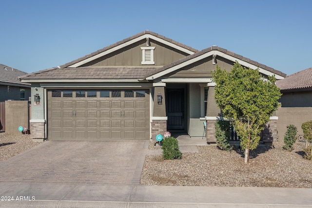 view of front of home with a garage