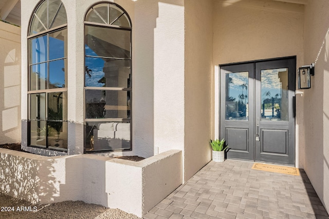 property entrance featuring french doors