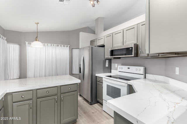 kitchen featuring stainless steel appliances and gray cabinetry