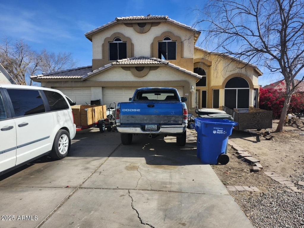 view of front of property with a garage