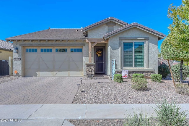 view of front of property with a garage