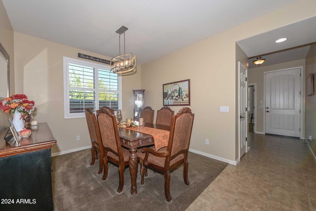 dining area featuring a chandelier