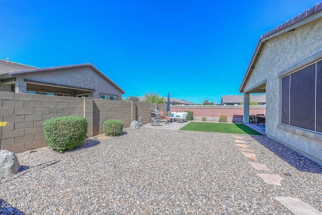 view of yard with a patio area